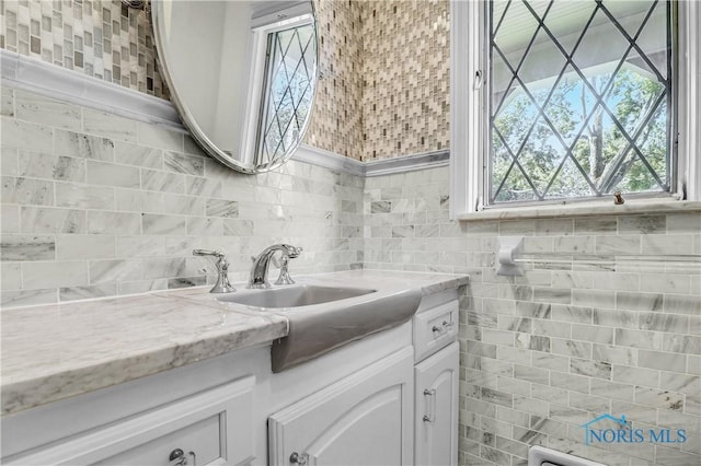 3998 W Bancroft St, Ottawa Hills, OH 43606 - bathroom featuring vanity and backsplash