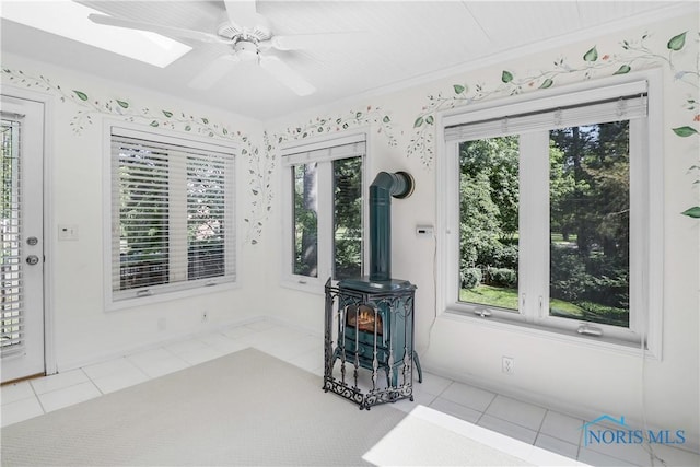 3998 W Bancroft St, Ottawa Hills, OH 43606 - tiled foyer entrance with a wood stove and ceiling fan