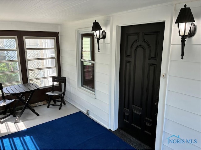 4033 Eastway St, Toledo, OH 43612 - doorway to property featuring covered porch