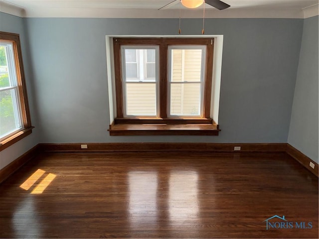 4033 Eastway St, Toledo, OH 43612 - empty room featuring dark wood-type flooring and ceiling fan