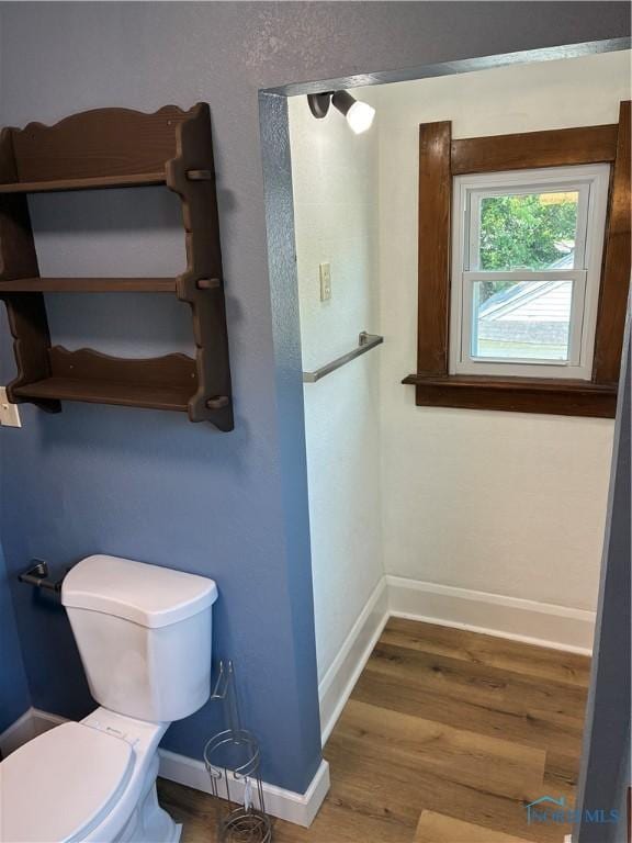 4033 Eastway St, Toledo, OH 43612 - half bathroom featuring toilet and wood finished floors