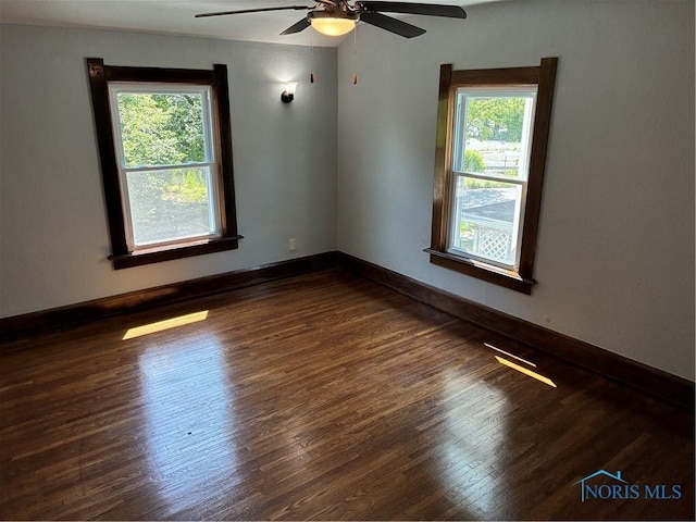 4033 Eastway St, Toledo, OH 43612 - unfurnished room featuring plenty of natural light, wood finished floors, and ceiling fan