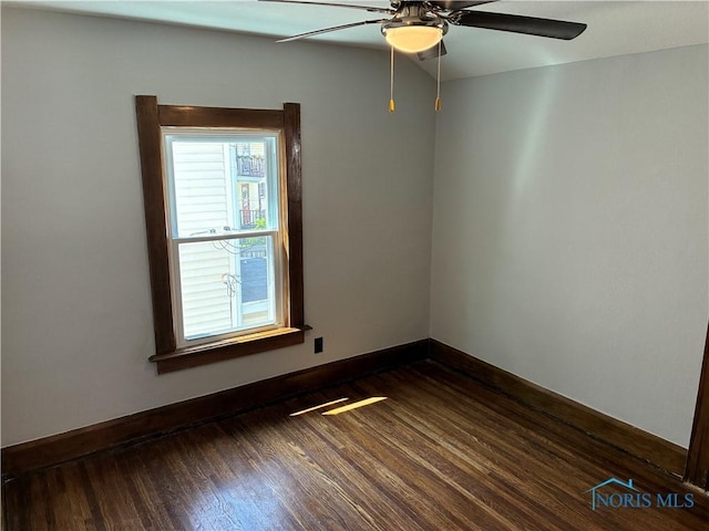 4033 Eastway St, Toledo, OH 43612 - empty room featuring ceiling fan and dark wood finished floors