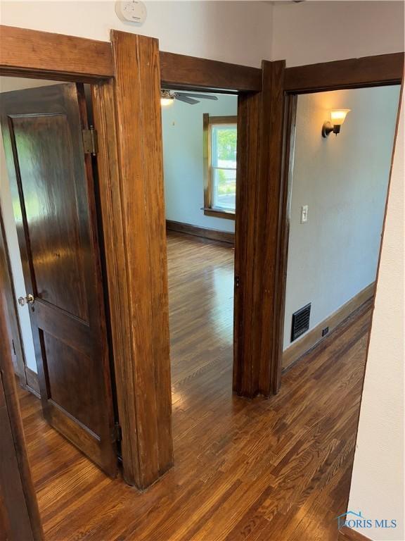 4033 Eastway St, Toledo, OH 43612 - corridor featuring wood finished floors and baseboards