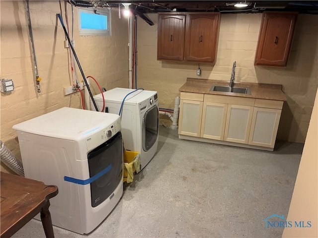 4033 Eastway St, Toledo, OH 43612 - basement featuring a sink and washer and dryer
