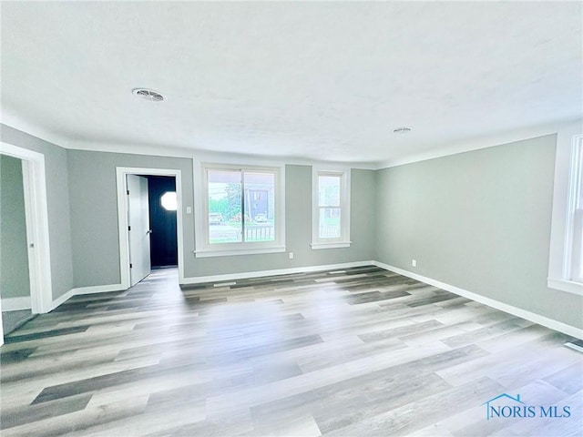 127 W Maumee Ave, Napoleon, OH 43545 - unfurnished room with baseboards and wood finished floors