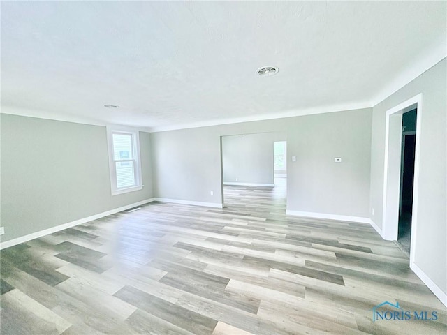 127 W Maumee Ave, Napoleon, OH 43545 - unfurnished room featuring light wood-type flooring