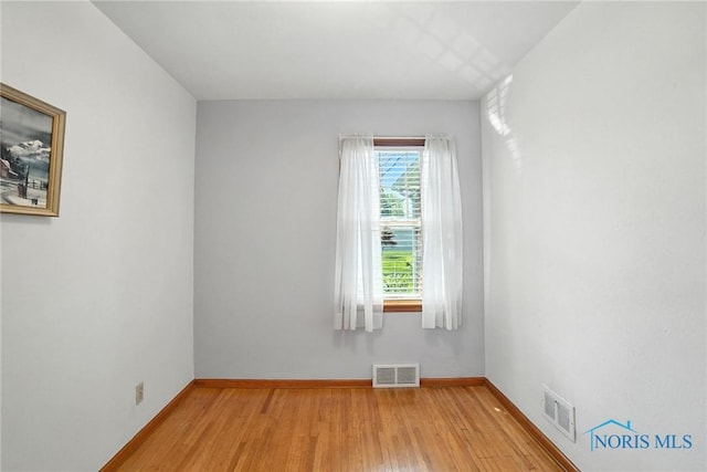 2632 117th St, Toledo, OH 43611 - unfurnished room with light wood-style flooring and baseboards