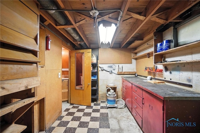 2632 117th St, Toledo, OH 43611 - basement with tile patterned floors and a workshop area