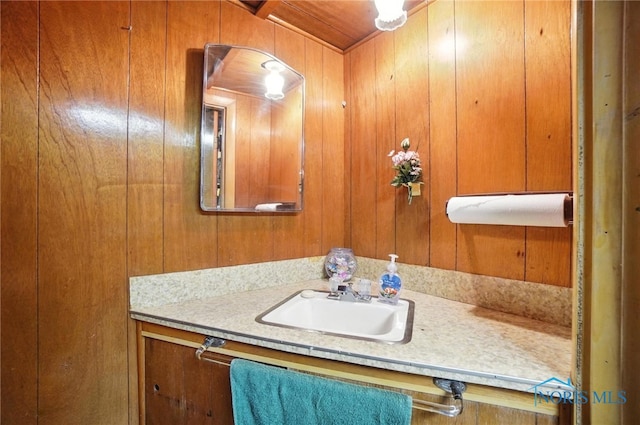 2632 117th St, Toledo, OH 43611 - bathroom featuring vanity and wood walls