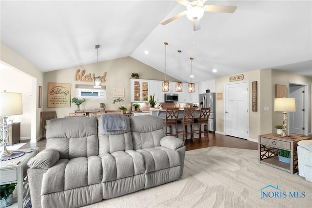 4825 Sylvan Prairie Ct, Sylvania, OH 43560 - living room featuring ceiling fan, vaulted ceiling, recessed lighting, and dark wood-type flooring