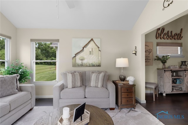 4825 Sylvan Prairie Ct, Sylvania, OH 43560 - living room with wood finished floors, lofted ceiling, and a ceiling fan