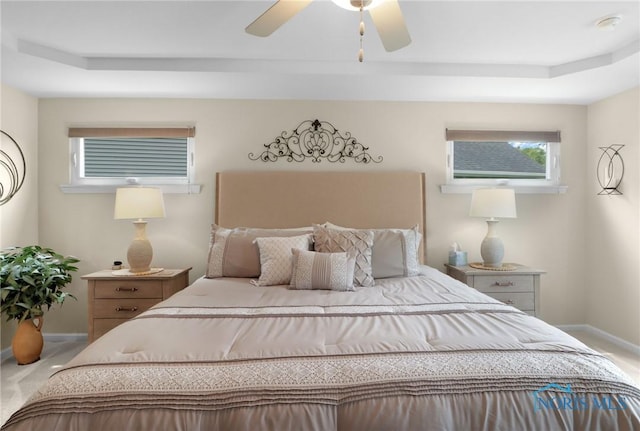 4825 Sylvan Prairie Ct, Sylvania, OH 43560 - carpeted bedroom featuring a raised ceiling and ceiling fan