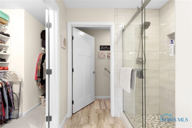4825 Sylvan Prairie Ct, Sylvania, OH 43560 - bathroom with a spacious closet and a stall shower