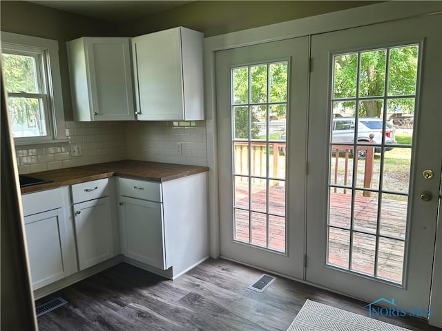 101 S Madison St, Antwerp, OH 45813 - kitchen with wooden counters, dark wood finished floors, and decorative backsplash