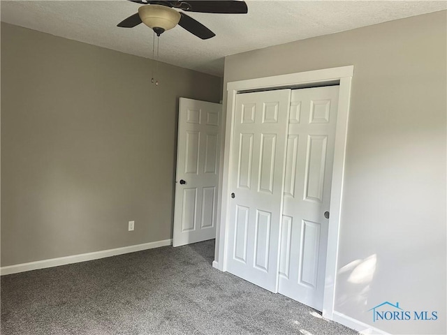 101 S Madison St, Antwerp, OH 45813 - unfurnished bedroom featuring carpet floors, a closet, a textured ceiling, and a ceiling fan