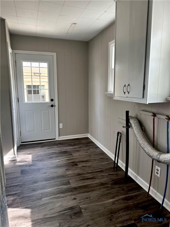 101 S Madison St, Antwerp, OH 45813 - doorway featuring dark wood-style flooring and baseboards