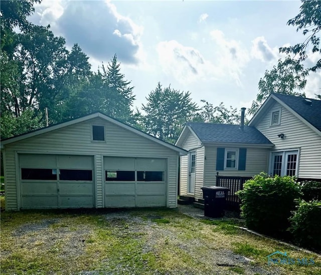 101 S Madison St, Antwerp, OH 45813 - view of side of property featuring a garage and an outdoor structure