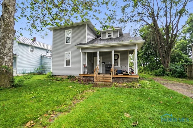 407 Washington St, Findlay, OH 45840 - view of front facade with a front yard and covered porch