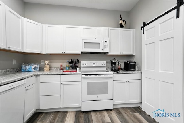 407 Washington St, Findlay, OH 45840 - kitchen featuring white appliances, white cabinetry, and light countertops