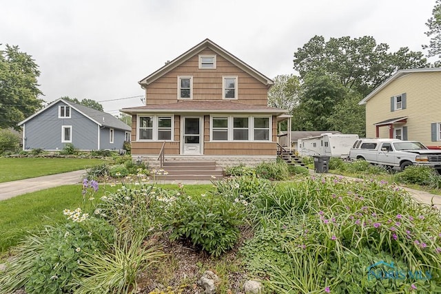 5712 Rambo Ln, Toledo, OH 43623 - view of front of home featuring a shingled roof