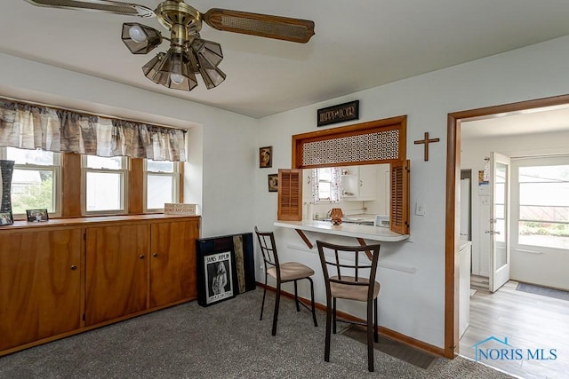 5712 Rambo Ln, Toledo, OH 43623 - dining room featuring ceiling fan and baseboards
