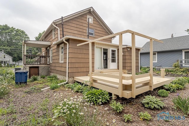 5712 Rambo Ln, Toledo, OH 43623 - rear view of house with a deck