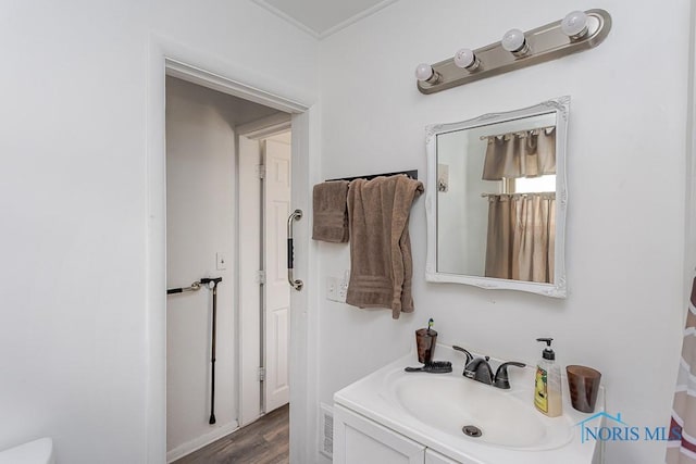 5712 Rambo Ln, Toledo, OH 43623 - full bath with vanity and wood finished floors