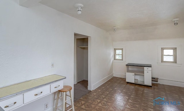 5712 Rambo Ln, Toledo, OH 43623 - interior space with plenty of natural light, light countertops, and white cabinetry