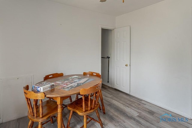 5712 Rambo Ln, Toledo, OH 43623 - dining area with light wood-type flooring and a ceiling fan