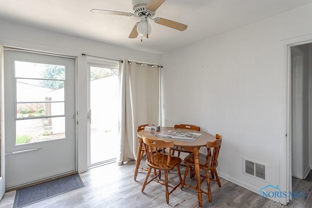 5712 Rambo Ln, Toledo, OH 43623 - dining room with wood finished floors and a ceiling fan