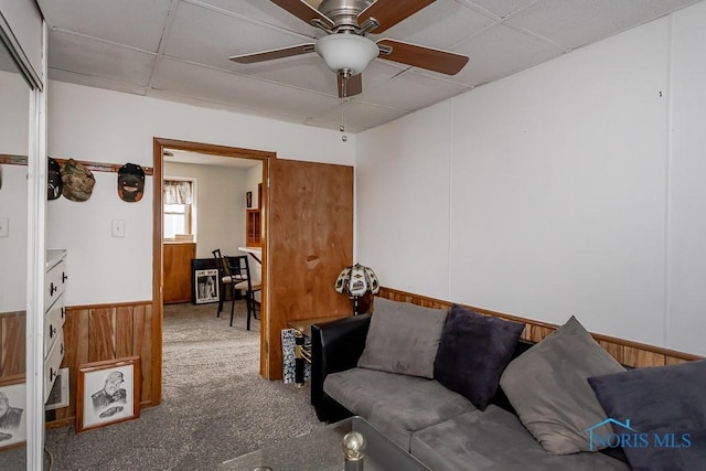 5712 Rambo Ln, Toledo, OH 43623 - carpeted living area featuring a ceiling fan and a drop ceiling