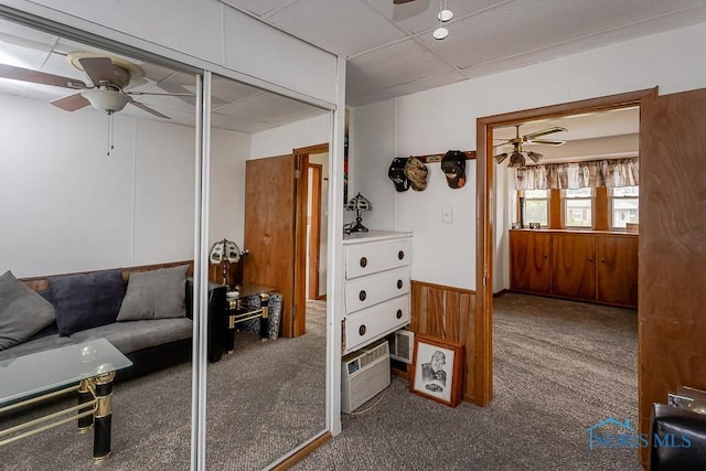 5712 Rambo Ln, Toledo, OH 43623 - carpeted living area with a ceiling fan