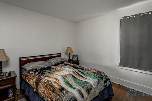 5712 Rambo Ln, Toledo, OH 43623 - bedroom with wood finished floors and baseboards