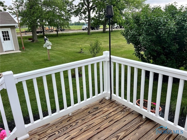 120 E Nicholas St, Arlington, OH 45814 - deck with a lawn