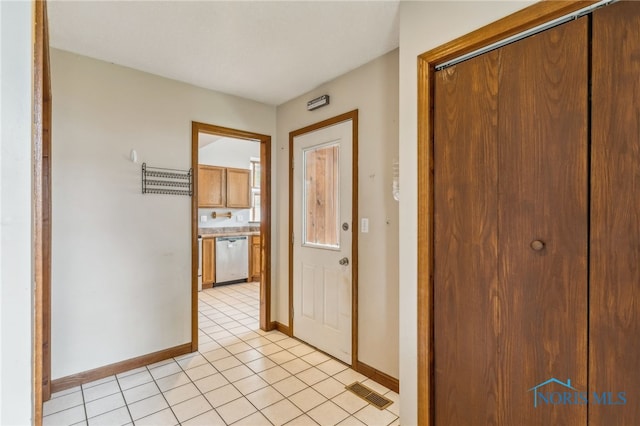 801 W Sandusky St, Findlay, OH 45840 - corridor featuring baseboards and light tile patterned flooring
