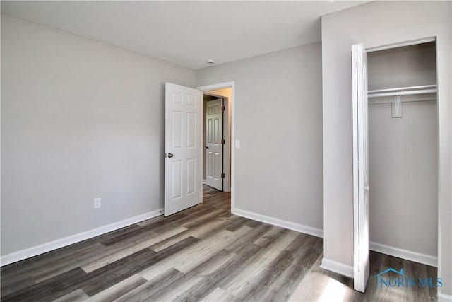 6182 Old Farm Ct, Toledo, OH 43612 - unfurnished bedroom with wood finished floors and a closet