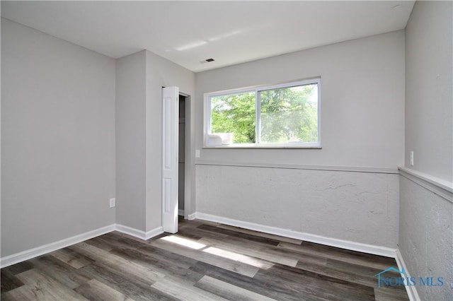 6182 Old Farm Ct, Toledo, OH 43612 - unfurnished room featuring wood finished floors and baseboards