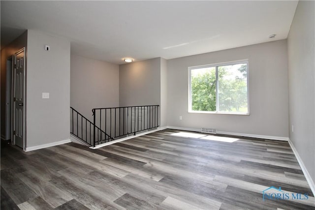 6182 Old Farm Ct, Toledo, OH 43612 - empty room with wood finished floors and baseboards