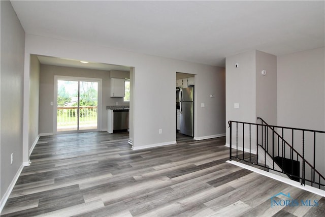 6182 Old Farm Ct, Toledo, OH 43612 - empty room featuring wood finished floors and baseboards
