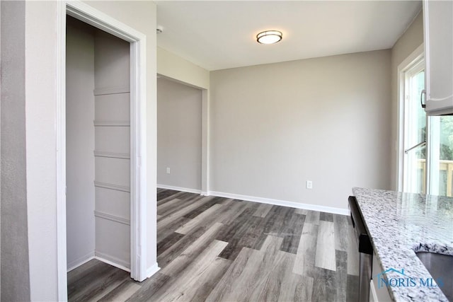 6182 Old Farm Ct, Toledo, OH 43612 - unfurnished dining area featuring dark wood finished floors and baseboards