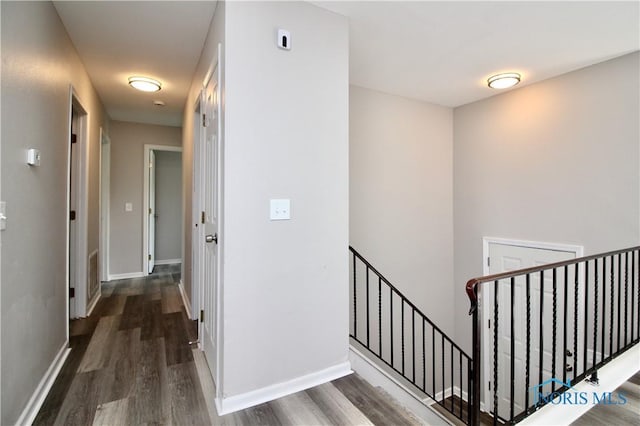 6182 Old Farm Ct, Toledo, OH 43612 - hallway with an upstairs landing and wood finished floors