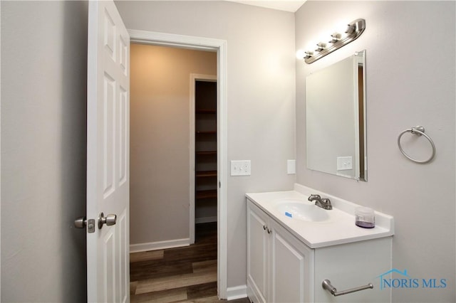 6182 Old Farm Ct, Toledo, OH 43612 - bathroom featuring vanity and wood finished floors