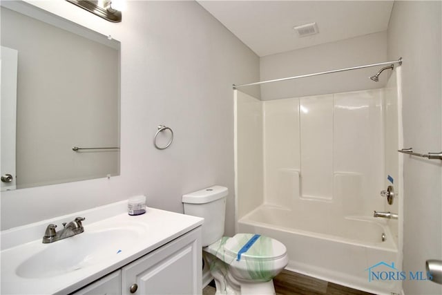 6182 Old Farm Ct, Toledo, OH 43612 - full bath with vanity,  shower combination, and wood finished floors