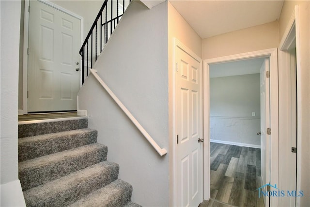 6182 Old Farm Ct, Toledo, OH 43612 - stairway with wood finished floors and baseboards