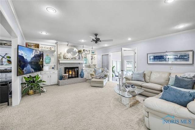 772 Fairway Ln, Wauseon, OH 43567 - living room featuring ornamental molding, ceiling fan, carpet flooring, a fireplace, and recessed lighting