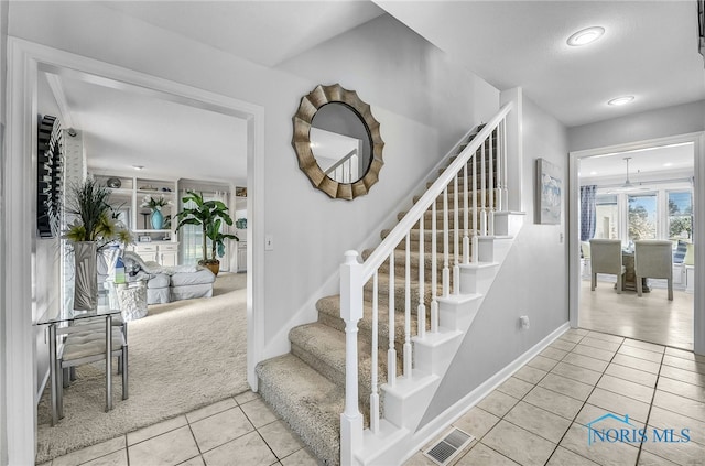 772 Fairway Ln, Wauseon, OH 43567 - staircase with tile patterned floors and recessed lighting