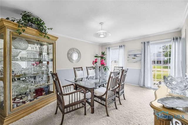 772 Fairway Ln, Wauseon, OH 43567 - dining room with light carpet and crown molding