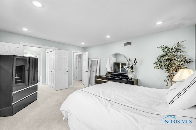 772 Fairway Ln, Wauseon, OH 43567 - carpeted bedroom with recessed lighting and high end refrigerator