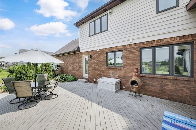 772 Fairway Ln, Wauseon, OH 43567 - wooden deck with outdoor dining area